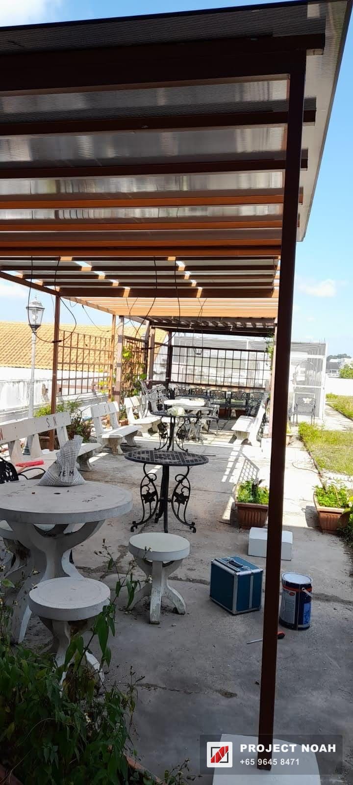 Pergola shading a rooftop garden terrace